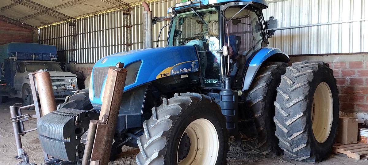 New Holland T7060, con Piloto