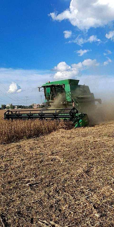 John Deere 1550, con Plataforma 30pies