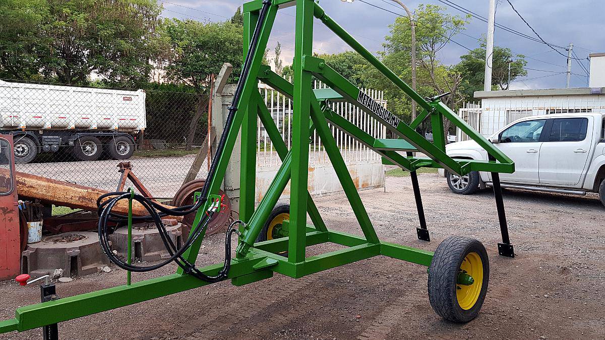 Elevador de Rollos con Piston Cabeceo