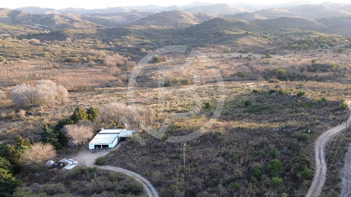 Terreno de 4 Ha en Falda del Carmen- con Arroyo, Casa