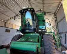 John Deere 1550, con Plataforma 25p