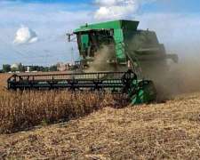 John Deere 1550, con Plataforma 30pies