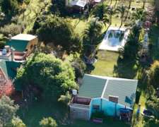 Campo Agrícola con Mejoras 27 Has.