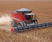 Massey Ferguson 9695 con Draper 35 Pies