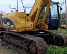 Excavadora Caterpillar 320 .