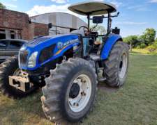 New Holland TD 5.90 con Elevador Frontal OM500