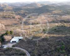 Terreno de 4 Ha en Falda del Carmen- con Arroyo, Casa