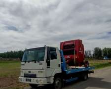Auxilio y Traslados de Vehiculos Pesados y Cargas Generales.