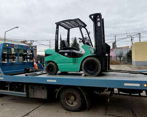 Auxilio y Traslados de Vehiculos Pesados y Cargas Generales.