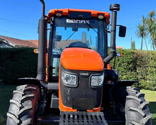 Tractor 115hp Conax con Traes Puntos Cabina