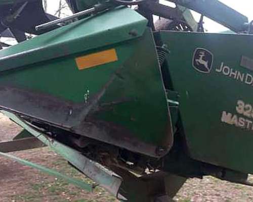 John Deere 1550, con Plataforma 30pies