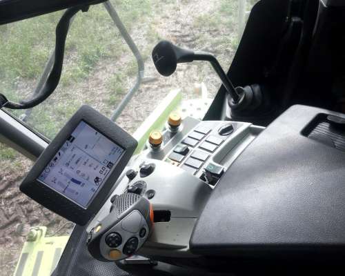 Claas Tucano 570 con Plataforma 35 Pies Maxiflex