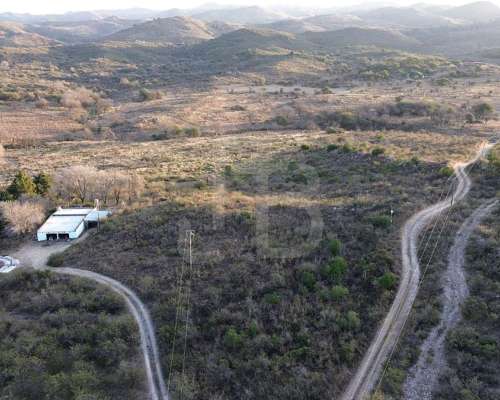 Terreno de 4 Ha en Falda del Carmen- con Arroyo, Casa