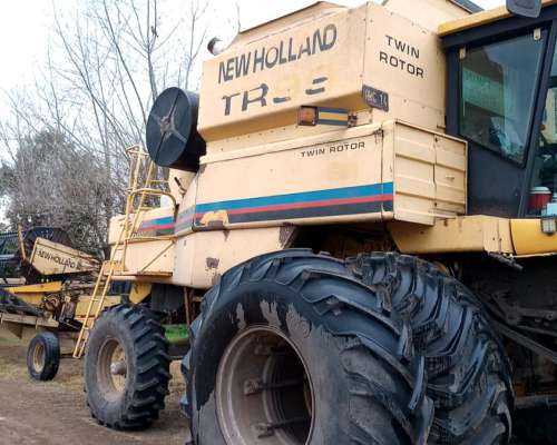 New Holland Tr99, con Plat 30 Pies
