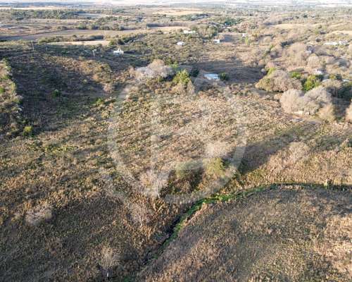 Terreno de 4 Ha en Falda del Carmen- con Arroyo, Casa