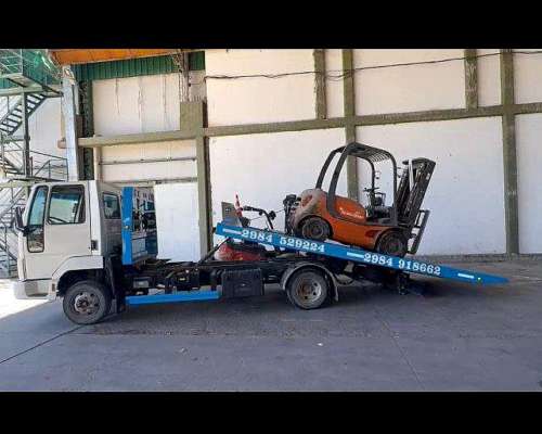 Auxilio y Traslados de Vehiculos Pesados y Cargas Generales.