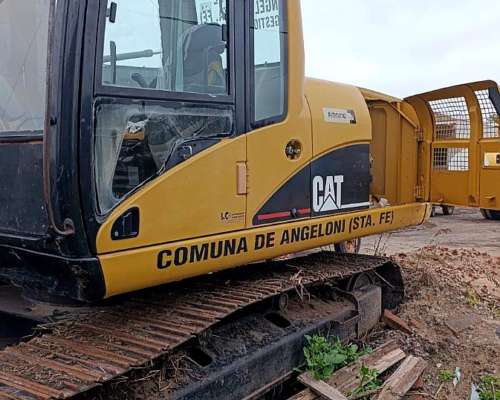 Excavadora Caterpillar 320 .