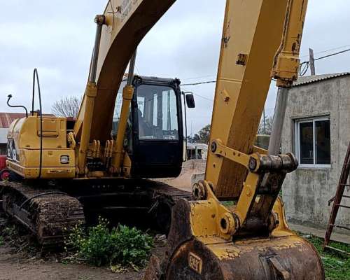 Excavadora Caterpillar 320 .