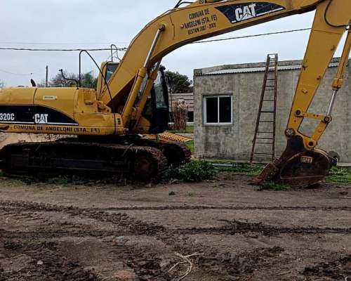 Excavadora Caterpillar 320 .