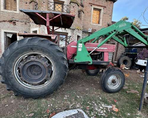 Massey Ferguson 1078 con Pala
