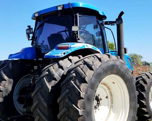 New Holland T7060, con Piloto