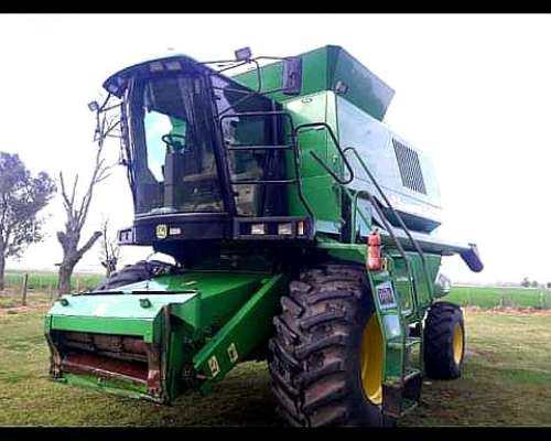 John Deere 1550, con Plataforma 30pies