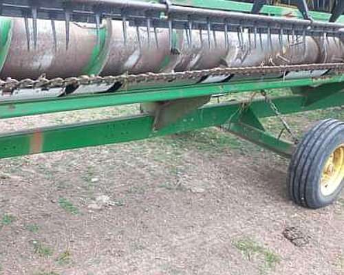 John Deere 1550, con Plataforma 30pies