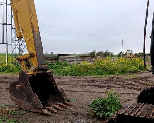 Excavadora Caterpillar 320 .