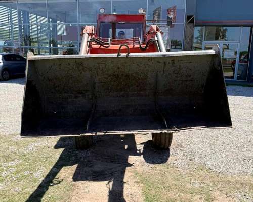Tractor Massey Ferguson 1215 con Pala