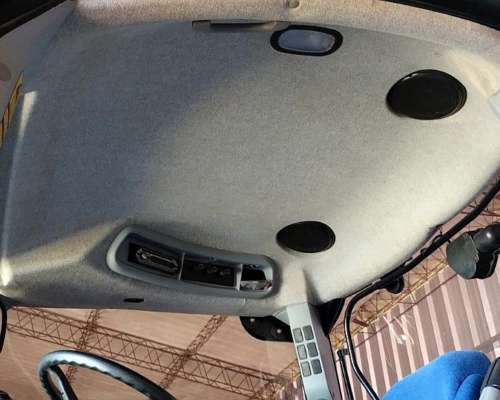 New Holland T7060, con Piloto