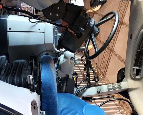 New Holland T7060, con Piloto